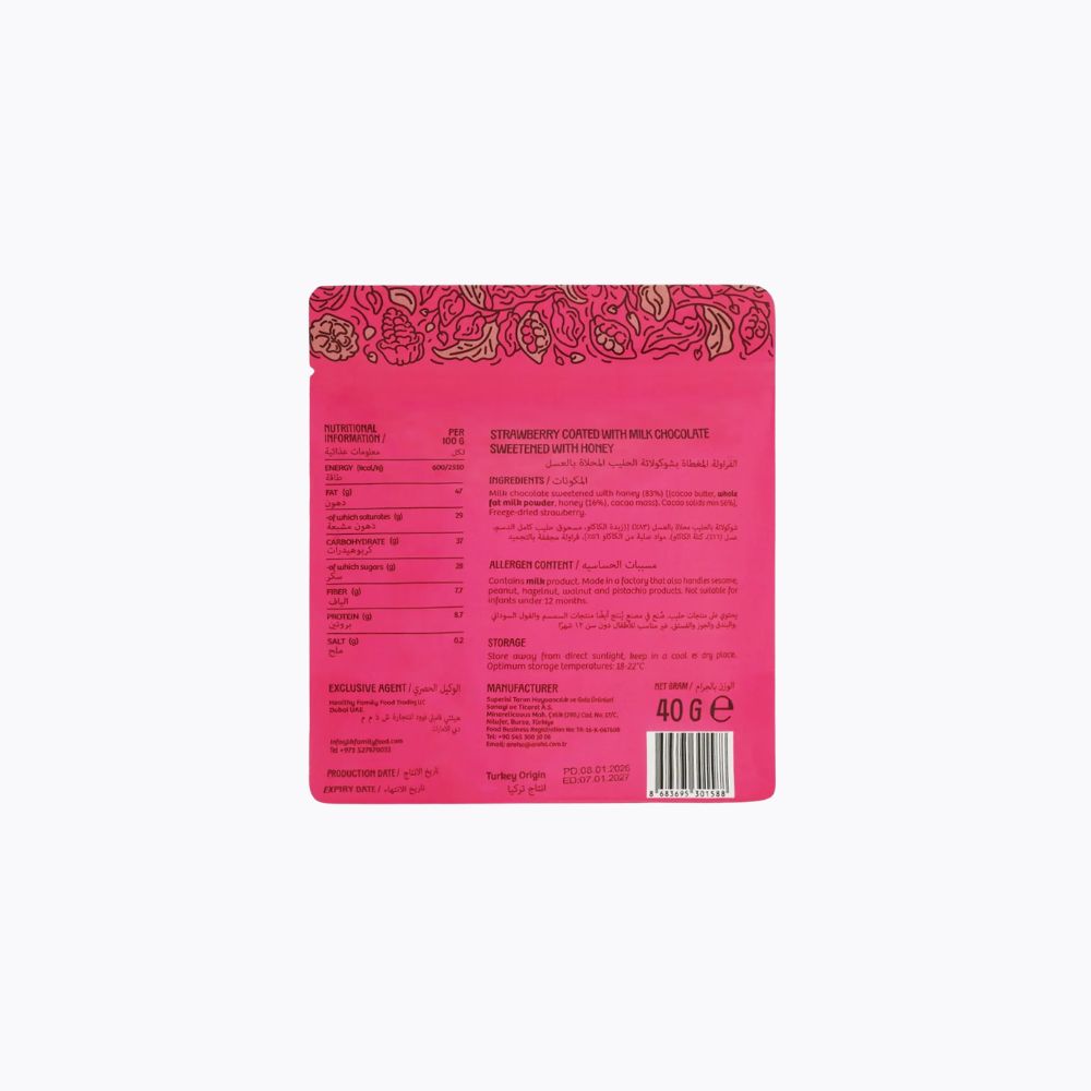 The back of a strawberry couched with milk chocolate sweetened coffee beverage pouch, featuring a vibrant pink background with a floral pattern at the top, nutritional facts, and a barcode.