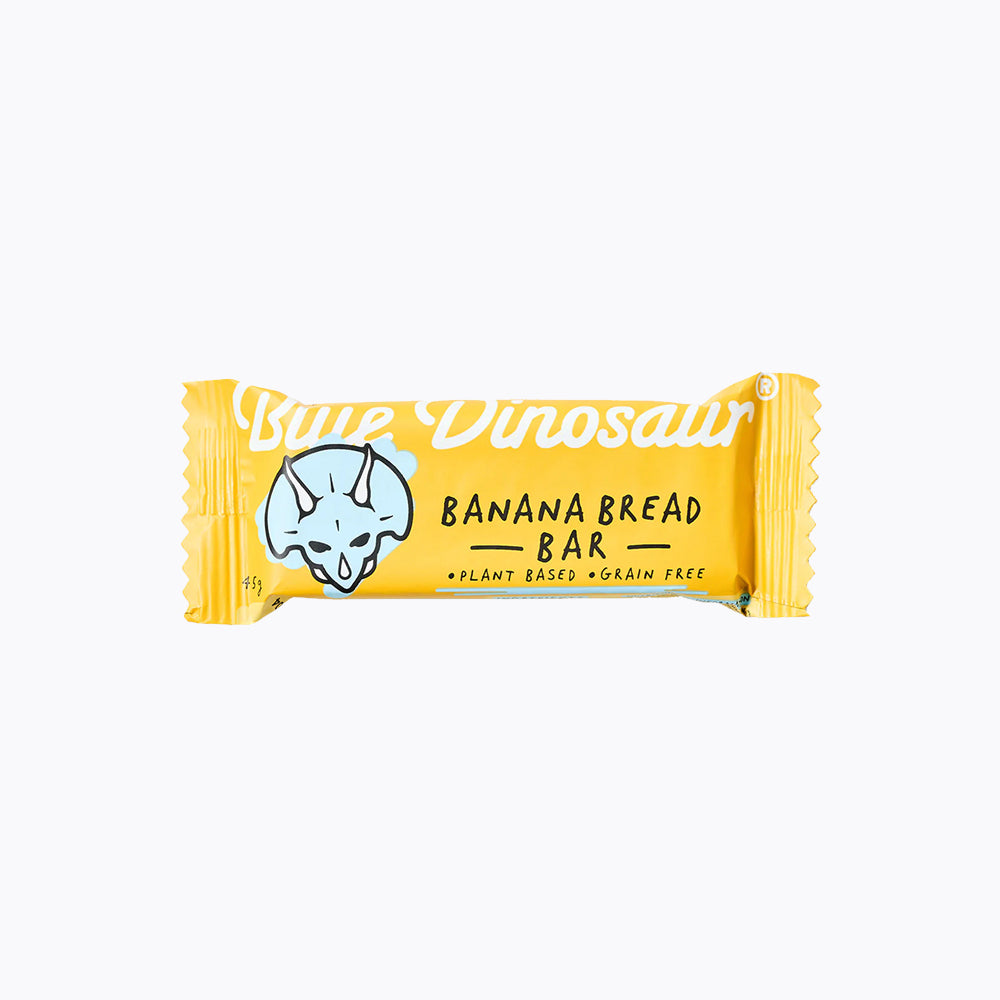 Packaging of Blue Dinosaur Banana Bread Bar which is grain free, plant based, and refined sugar free.