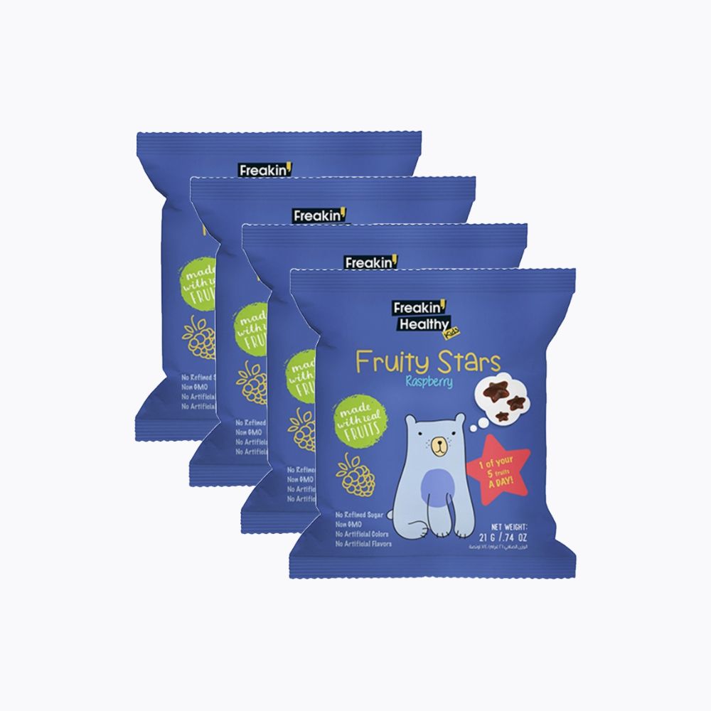Four packages of Freakin Healthy Fruity Stars Raspberry on a white background
