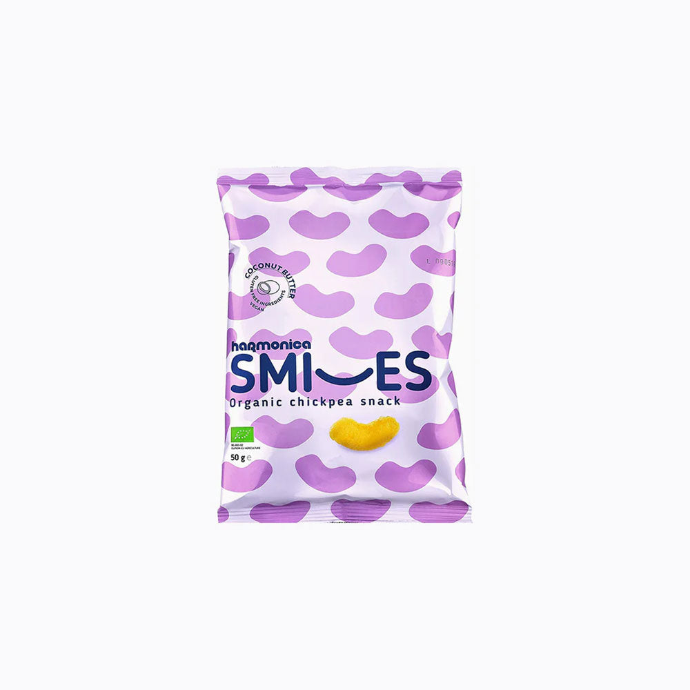 A package of Harmoniea Smiles organic chickpea snack with a visual of a chickpea on the front, against a purple background.