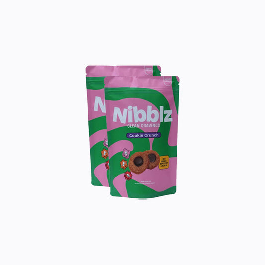 Two packages of Nibblz Cookie Crunch on a white background