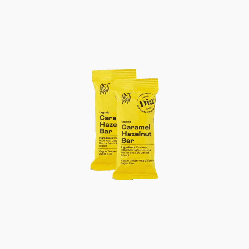 Two yellow organic chocolate bar packages on a white background