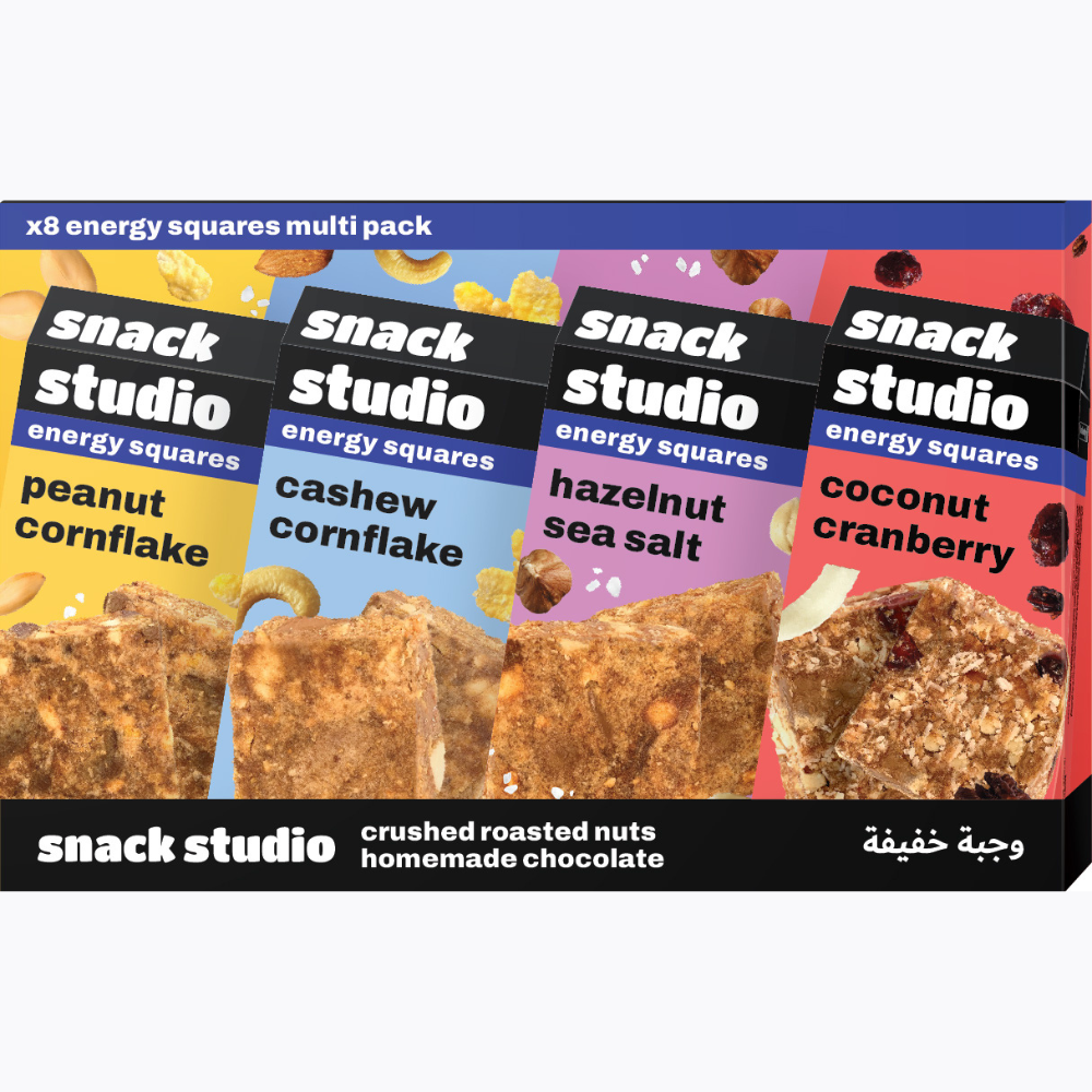 Packaging of snack studio energy squares with various flavors on a white background