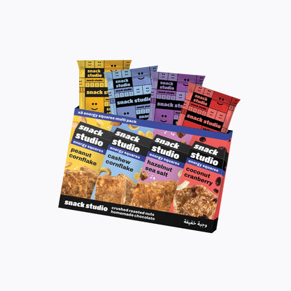 Assorted packages of snack studio products on a white background
