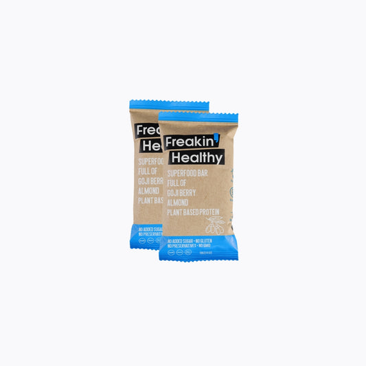 Two Freckin Healthy protein bars on a white background