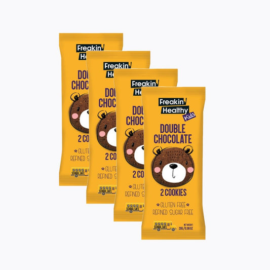 Four packages of Freakin' Healthy Double Chocolate cookies on a white background