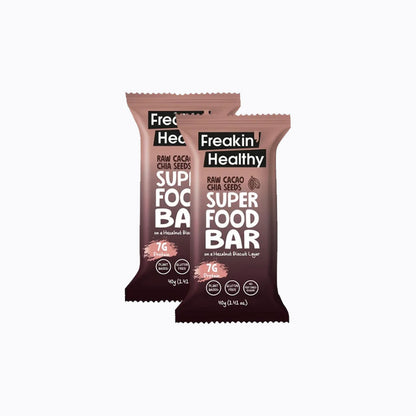 Two Freakin' Healthy super food bars on a white background