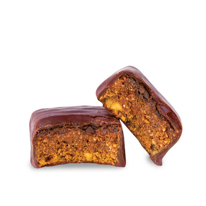 Two chocolate-covered treats with a visible filling on a white background