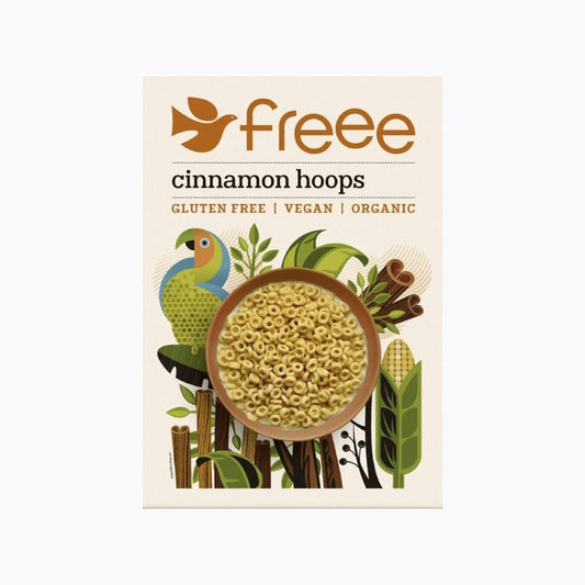 Packaging of cinnamon hoops with branding and product details on a beige background
