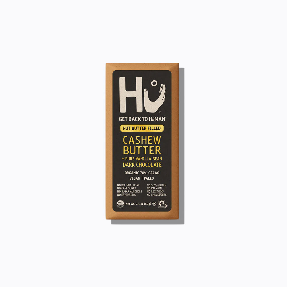 A package of Hu brand Dark Chocolate with Cashew Butter and Vanilla, 60g, labeled vegan and gluten-free.