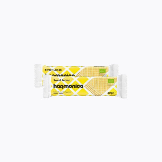 Two packages of 'Sweet Lemon' harmonica bars on a white background