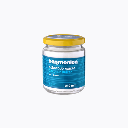 Jar of harmonica coconut butter with blue label and yellow lid on a white background