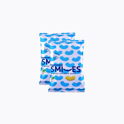 Two packages of Heumans Organic Smiles chickpea snack on a white background