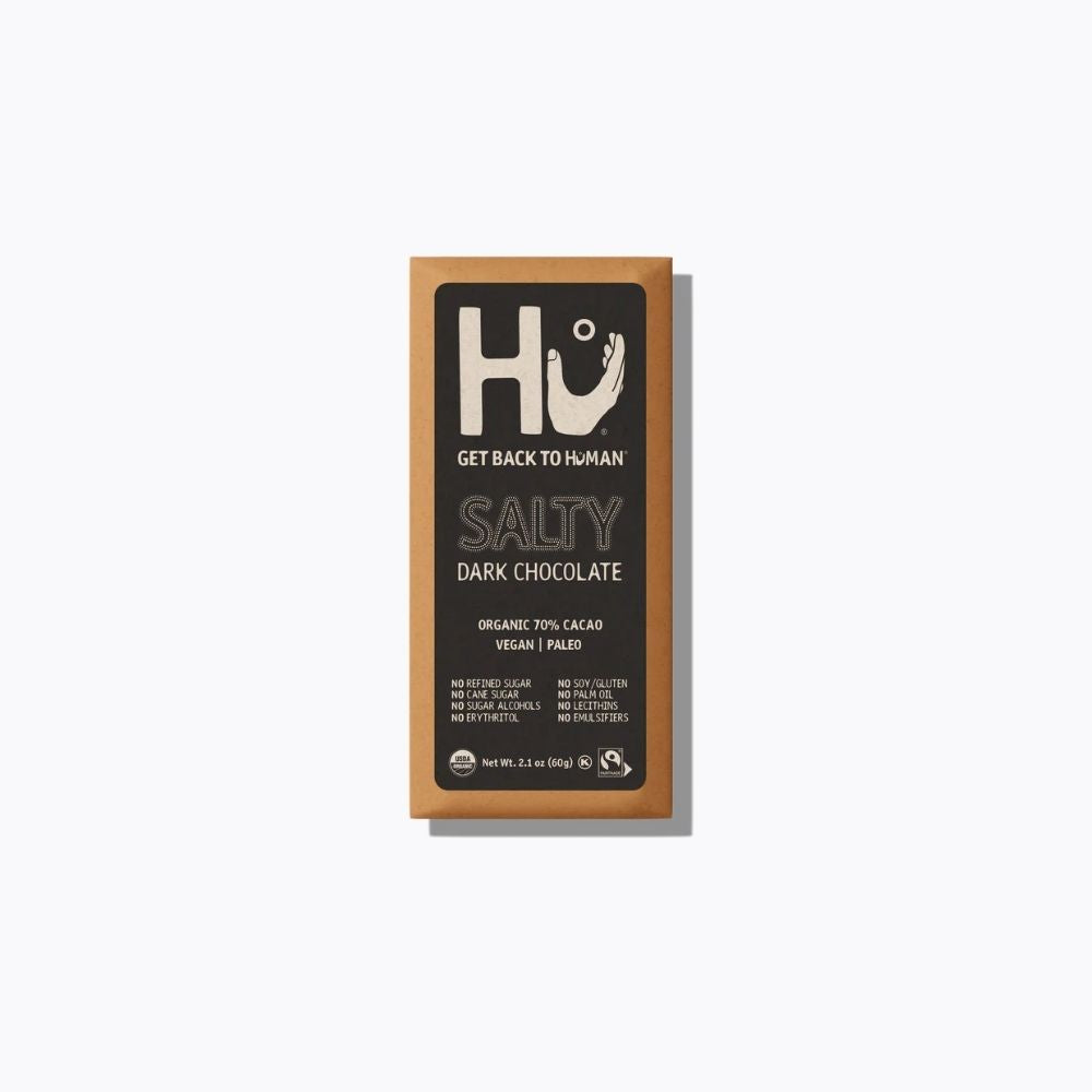 Dark chocolate bar packaging with 'Hu' brand on a white background