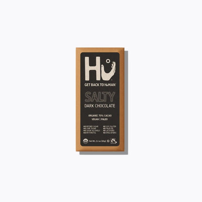 Dark chocolate bar packaging with 'Hu' brand on a white background