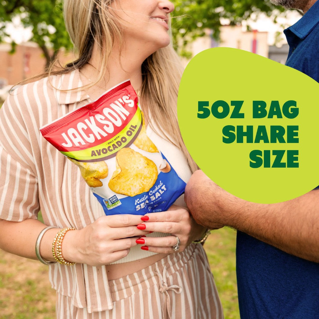 Promotional image of Jackson's Sweet Potato Chips packaging with text about a new bag design on a green background.