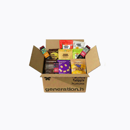 Cardboard box with various snack packets from 'generation.h' on a white background