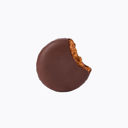 Chocolate-covered cookie with a bite taken out on a white background