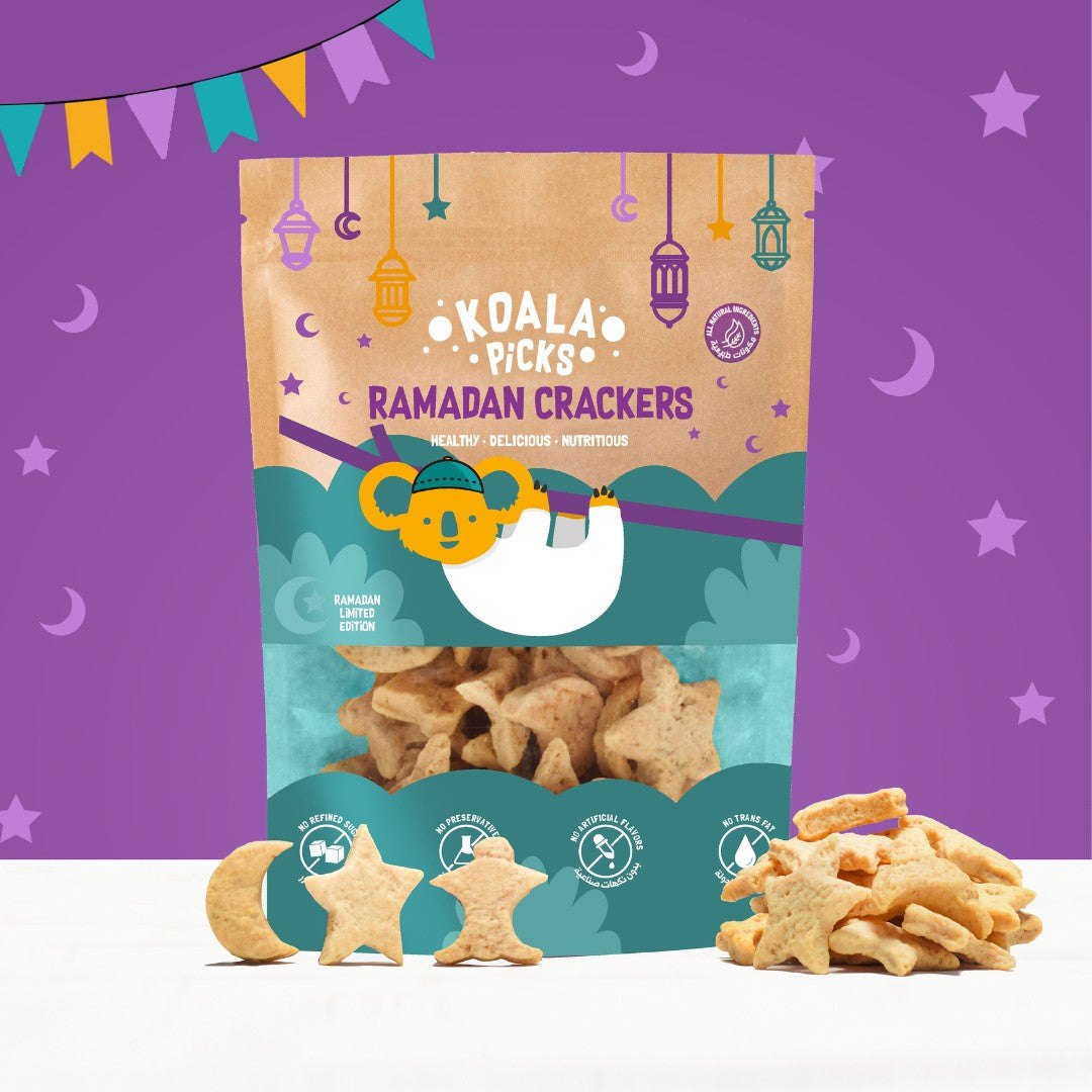 Packaging of Koala Bites Ramadan Crackers with cookies on a purple background