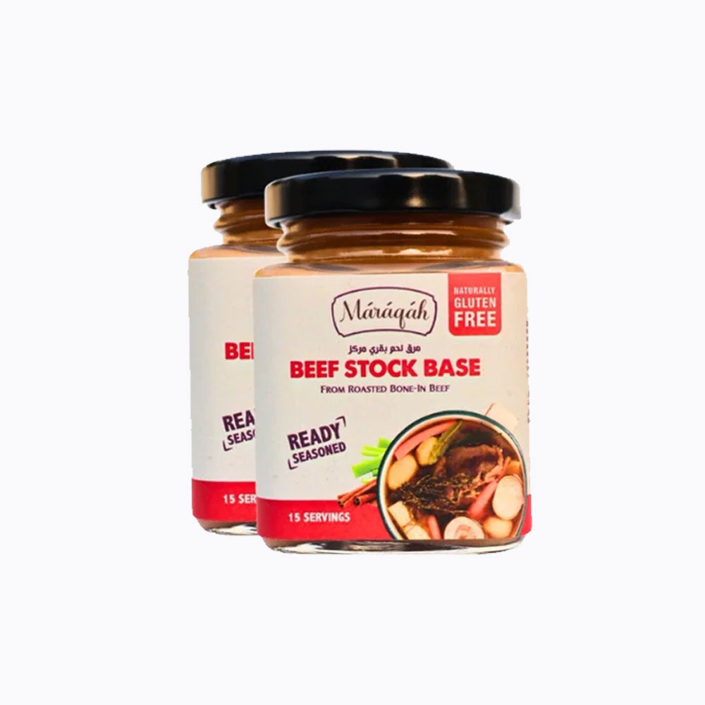Two jars of beef stock base with labels on a white background