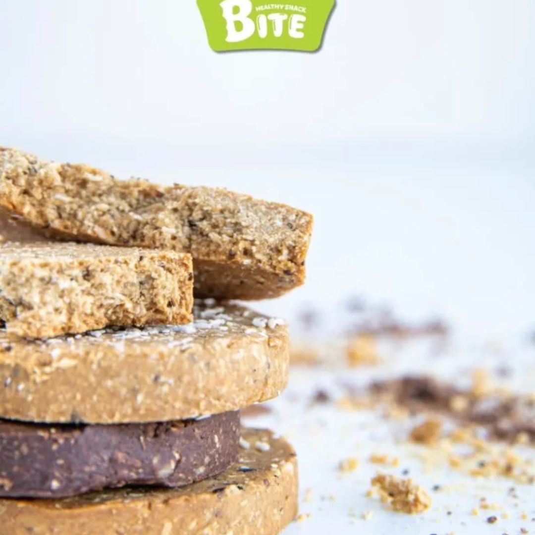 Stack of granola bars with 'Bite' brand logo in the corner