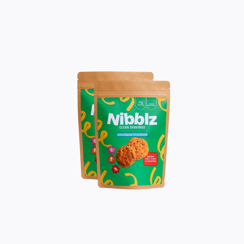 Two green Nibblz snack packages with a white background