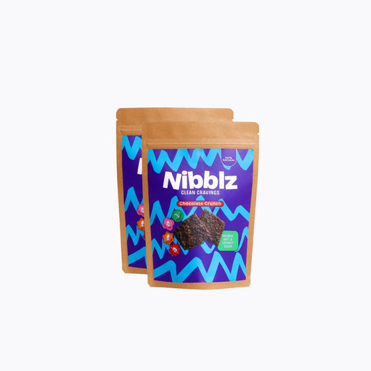 Two Nibblz chocolate crunch snack packages on a white background