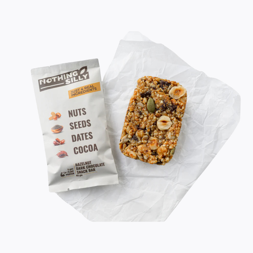 Snack bar with packaging labeled 'Nothing Silly' on a white background