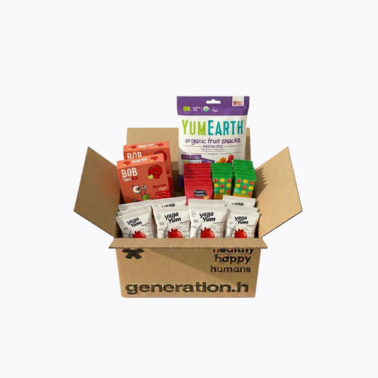 Box of YumEarth organic fruit snacks and other products on a white background