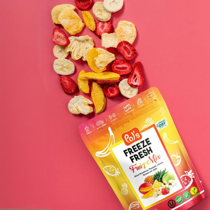 Packaged freeze-dried fruit mix with a pink background