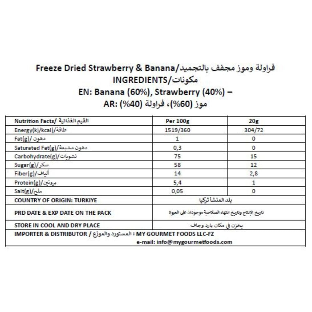 A text and nutrition facts table for a freeze dried strawberry and banana product, with English and Arabic headings, ingredient percentages, and a nutrition grid showing per 100g and 20g values.