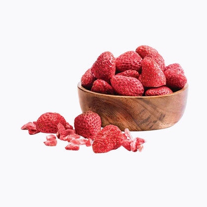 Wooden bowl filled with red strawberries on a white background