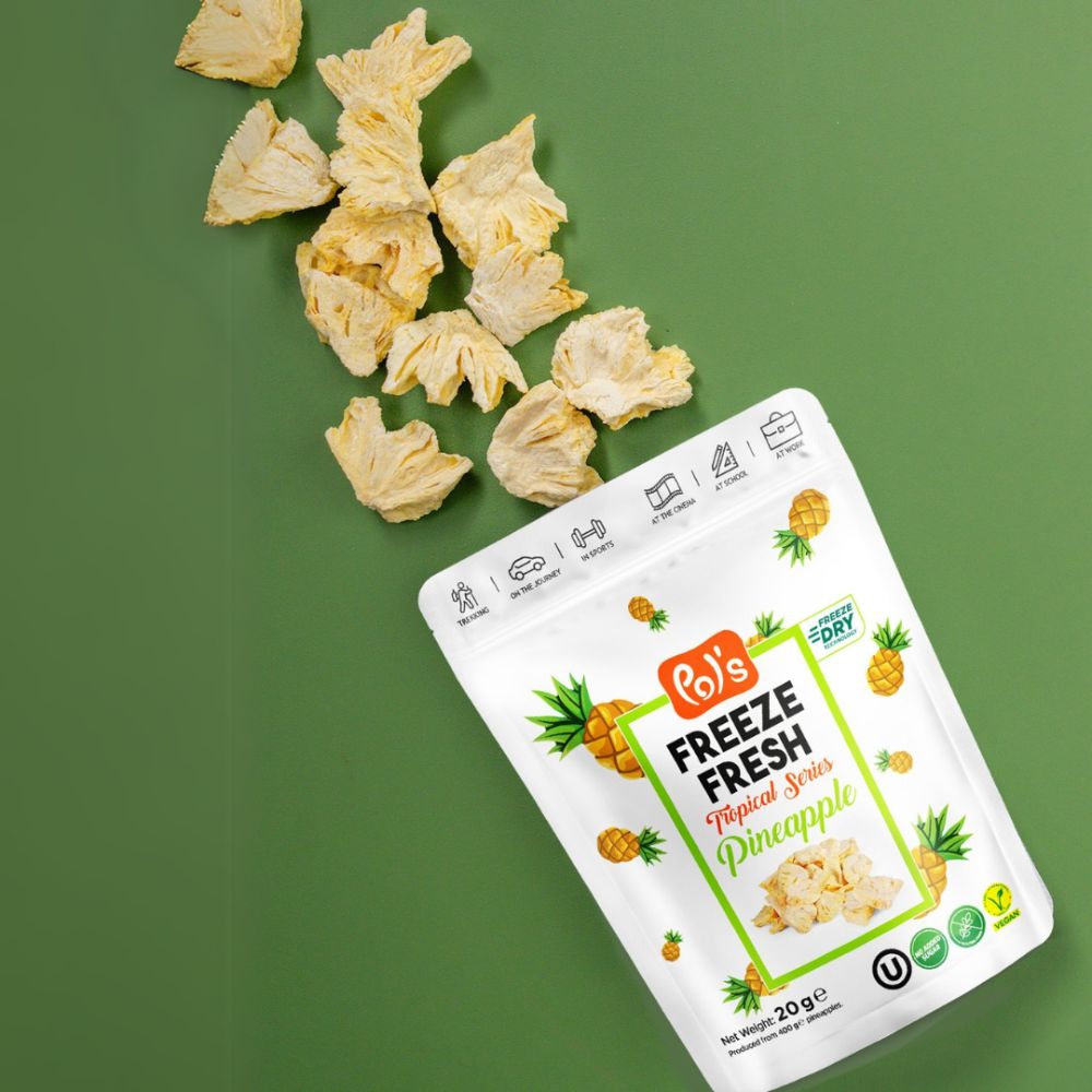 Packaged tropical fruit snacks with visible brand label on a green background