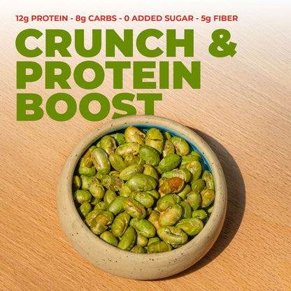 Bowl of green protein snacks with nutritional information on a wooden surface