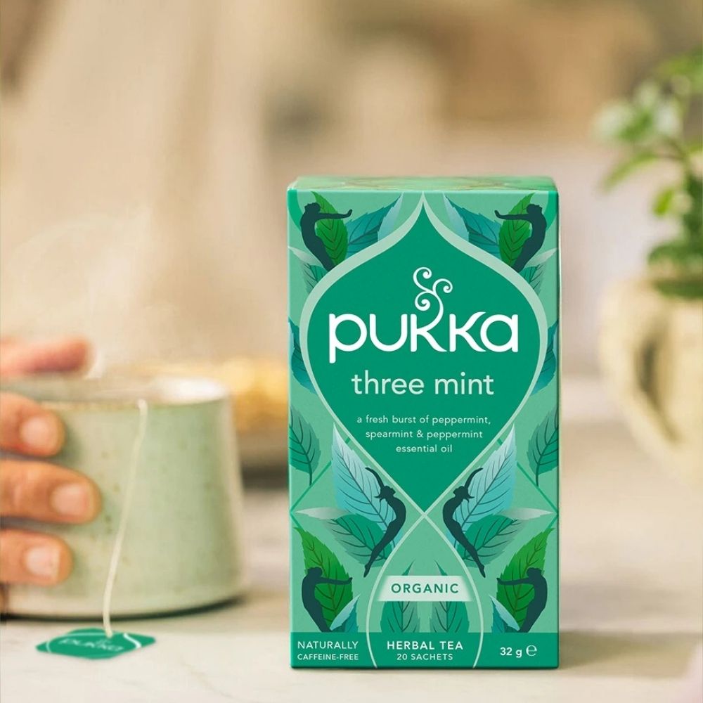 Pukka three mint tea box on a blurred background