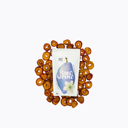 Packaged snack with 'Raw Grow' branding surrounded by circular orange snacks on a white background