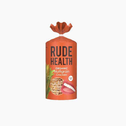 Orange packaging of Rude Health organic multigrain crackers on a white background