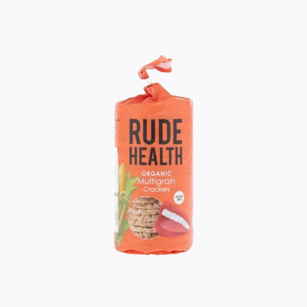 Orange packaging of Rude Health organic multigrain crackers on a white background