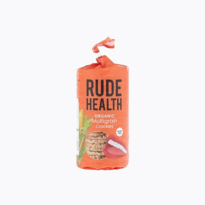 Orange packaging of Rude Health organic multigrain crackers on a white background