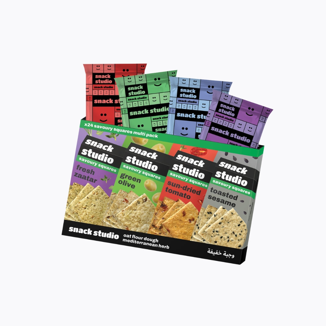 Pack of snack studio crackers with colorful packaging on a white background