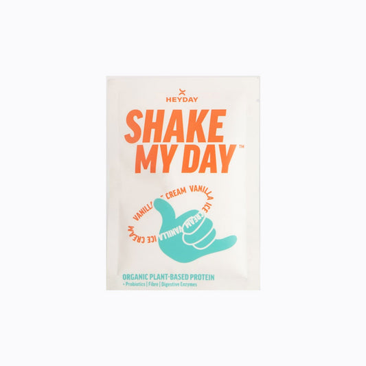 Protein powder package with 'Shake My Day' text and Heyday branding on a white background