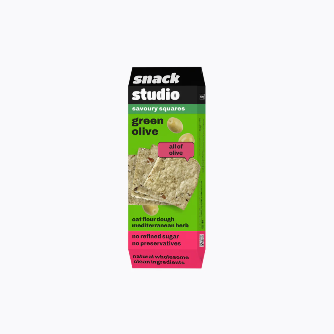 Box of Snack Studio green olive savoury squares on a white background