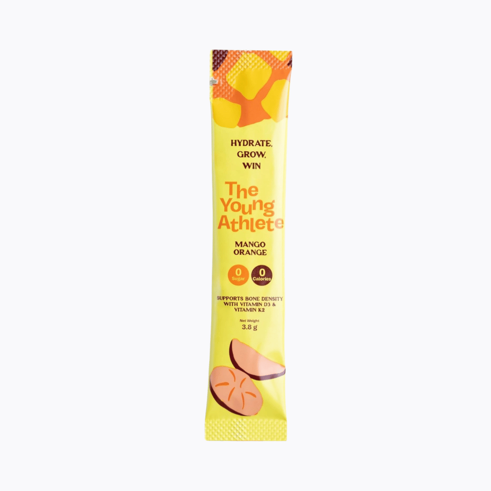 Two yellow packets labeled 'The Young Athlete' with a mango graphic on a white background.