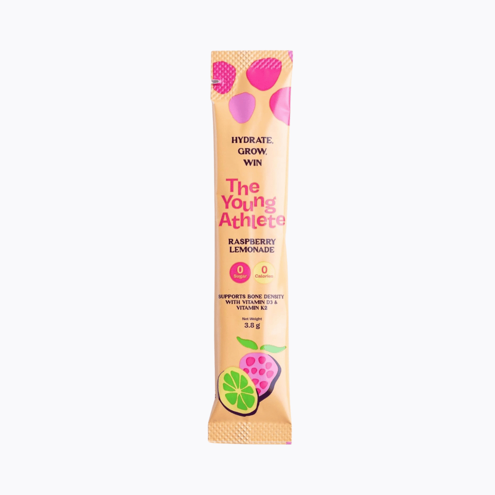 The Young Athlete protein bar with pink and orange design on a white background