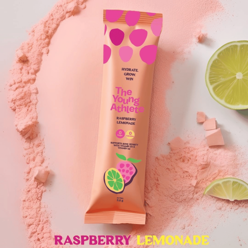 Three 'The Young Athlete' product tubes on a colorful background with fruit graphics.