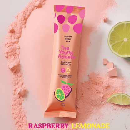 Three 'The Young Athlete' product tubes on a colorful background with fruit graphics.