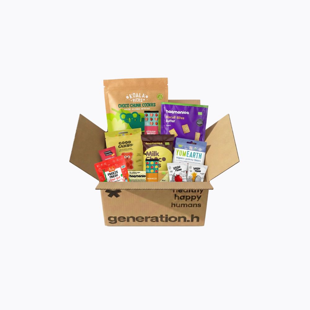 Open cardboard box filled with various snack packages on a white background, branded 'generation.h'.