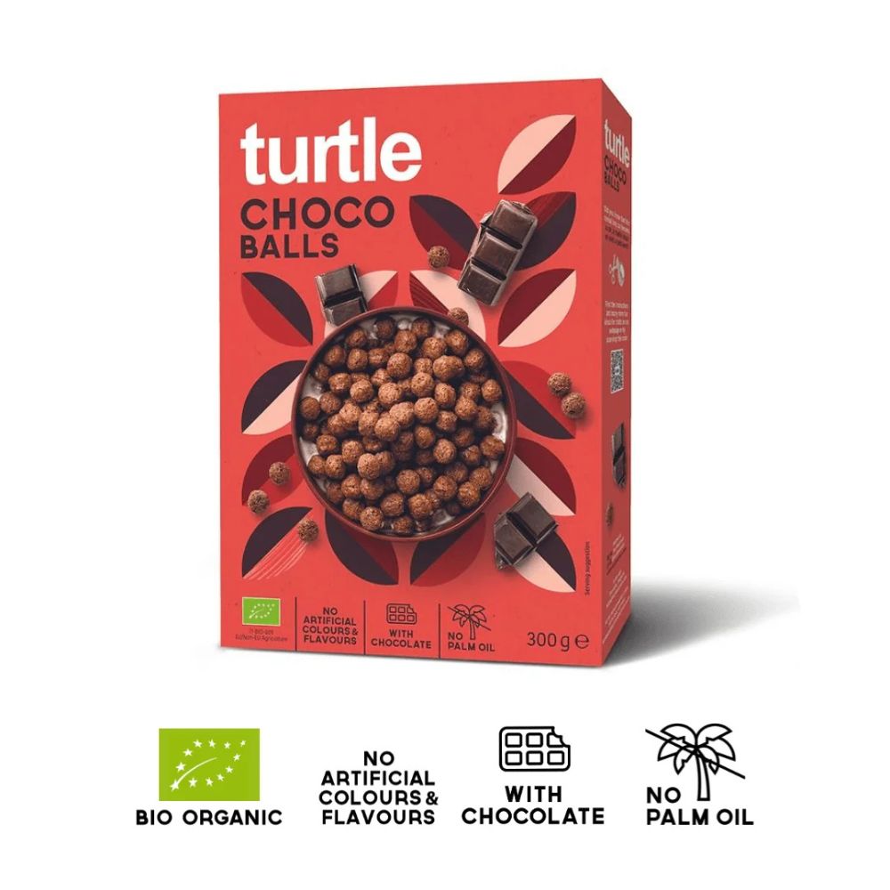A 300 g box of turtle Choco Balls cereal with chocolate pieces, shown on a white background with four feature icons below: Bio Organic, No Artificial Colours & Flavours, With Chocolate, and No Palm Oil.