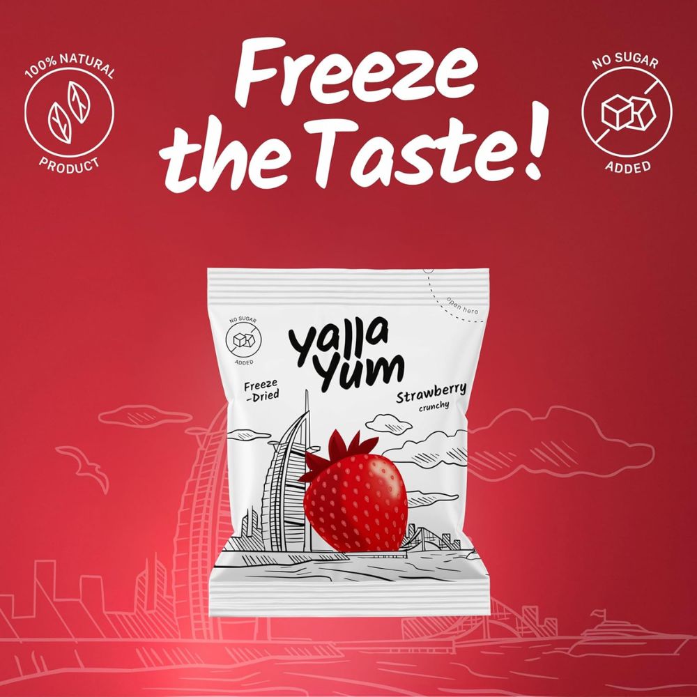 Yalla Yum freeze-dried strawberry snack package on a red background with text 'Freeze the Taste!'.