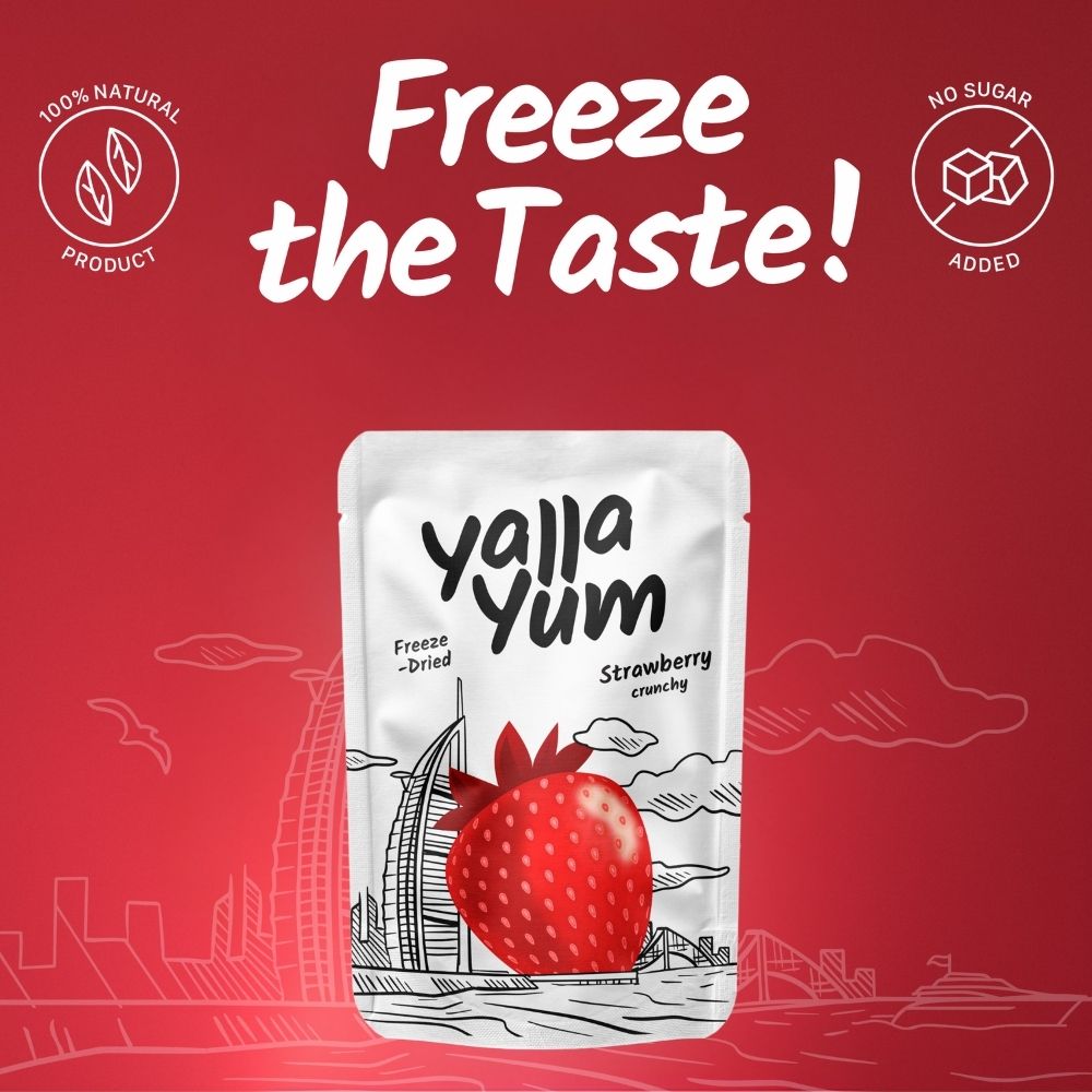 Yalla Yum freeze-dried strawberry snack package on a red background with text 'Freeze the Taste!'.